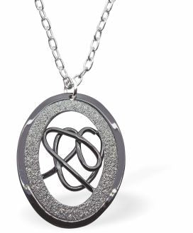 Black and Grey Glitzy Oval Necklace Rhodium Plated, Hypoallergenic; Lead, Cadmium and Nickel Free 38mm in size Colour: Brown, Gold and Silver Chain: Rhodium Plated, 18" / 3" Extension