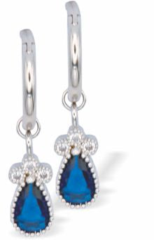 Delicate Sapphire Teardrop Silver Coloured Stud Earrings
34mm in size

Colour: Silver Coloured. Blue Crystals
Rhodium Plated
Delivered in a soft, black, velveteen pouch
