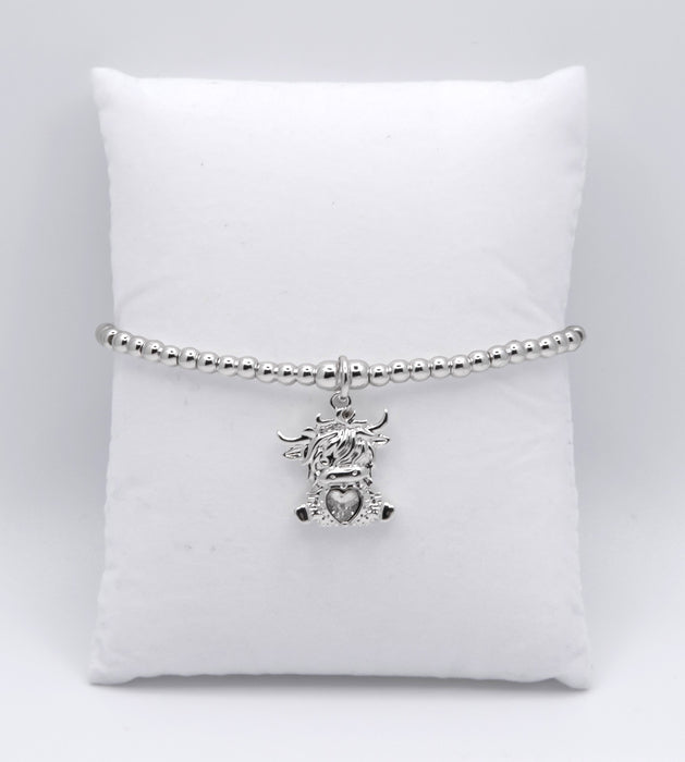 HC52 - Stretch Charm Bracelet with Silver Coloured Beads and Bonnie Highland Cow Charm