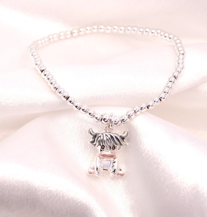 HC58 - Stretch Charm Bracelet with Silver Coloured Beads and Rosie Highland Cow Charm
