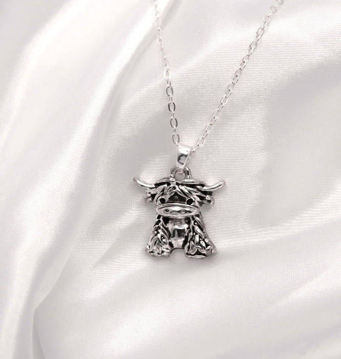 HC62 - Silver Coloured Maisie the Long Horn Highland Cow Necklace with a choice of chains