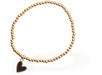 Dainty Heart Bracelet, Black Heart Charm
Hypoallergenic: Nickel, Lead and Cadmium Free

Colour: Black and Golden Coloured
Chain:&nbsp;Rhodium Plated
Delivered in a soft, black, velveteen pouch
