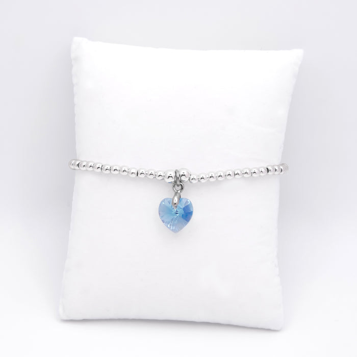 BR16 - Charm Bracelet with Crystal Heart Charm Embellished with Crystals by Swarovski® in Aquamarine Blue, Rhodium Plated