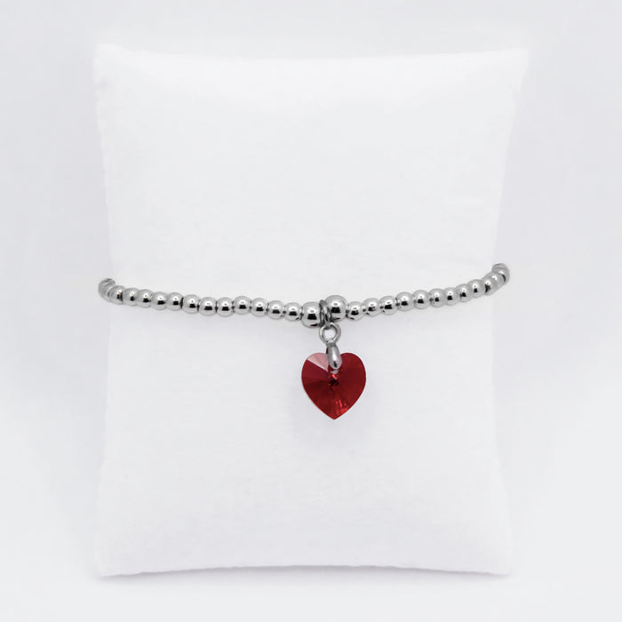 BR17 - Charm Bracelet with Crystal Heart Charm Embellished with Crystals by Swarovski® in Siam Red, Rhodium Plated
