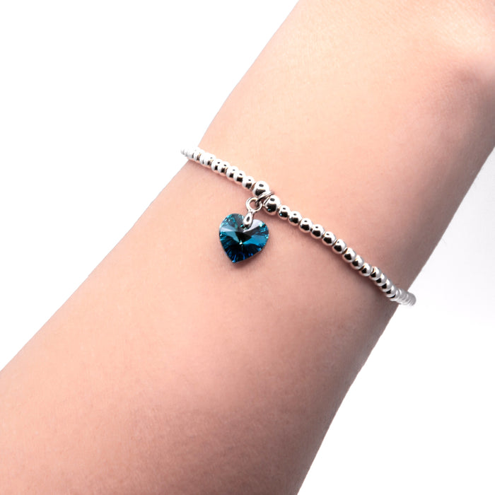 BR18 - Charm Bracelet with Crystal Heart Charm Embellished with Crystals by Swarovski® in Bermuda Blue, Rhodium Plated