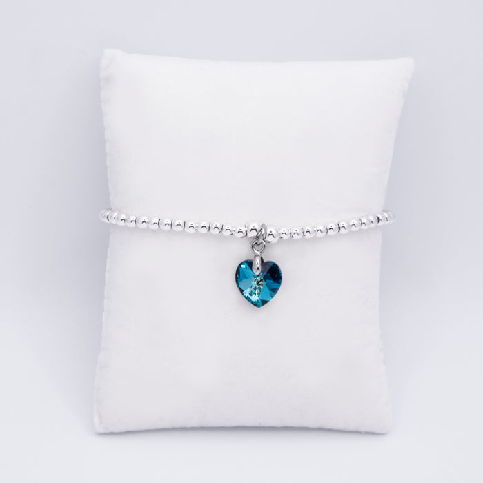 BR18 - Charm Bracelet with Crystal Heart Charm Embellished with Crystals by Swarovski® in Bermuda Blue, Rhodium Plated