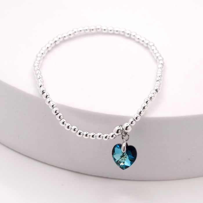 BR18 - Charm Bracelet with Crystal Heart Charm Embellished with Crystals by Swarovski® in Bermuda Blue, Rhodium Plated