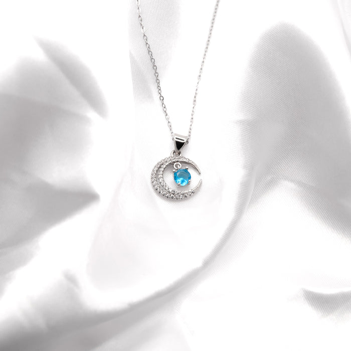C018 - Silver Coloured Pave Crystal Moon Necklace with Turquoise Drop