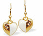 Golden Drop Earrings with White and Golden Coloured Heart Drops and Crystal Dots
Hearts are 10mm in size
Colour: White and Gold
&nbsp;Rhodium Plated Ear-wires
Delivered in a soft, black, velveteen pouch
