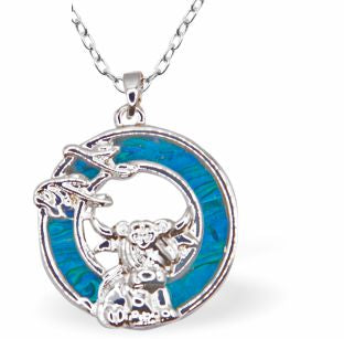 Paua Shell Highland Cow in Circle Necklace
25mm, Rhodium Plated

18" Chain
Hypoallergenic: Nickel, Lead and Cadmium free
Delivered in a soft, black, velveteen pouch