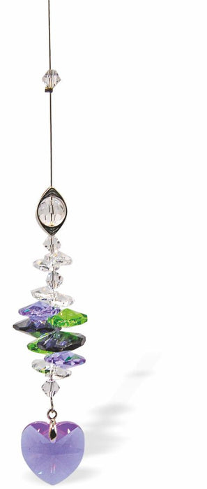 Austrian Crystal Suncatcher, Multi -faceted
Purple Crystal Heart Drop with mixed coloured crystals
Purple, Green and Clear Colours
Delivered in a soft, black, velveteen pouch