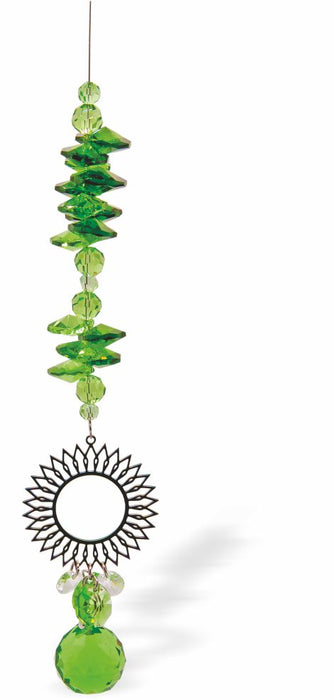 Austrian Crystal Suncatcher, Multi -faceted
Large Sun Link and Peridot Green Sphere Drop
Green and Clear crystals
Delivered in a soft, black, velveteen pouch
