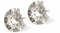 Sparkly Austrian Crystal Diamond-shape and Elegant Stud Earrings Round, Multi Faceted Crystal, 6mm and 7mm in size Colour: Sparkling Silver Shade Sterling Silver Earwires