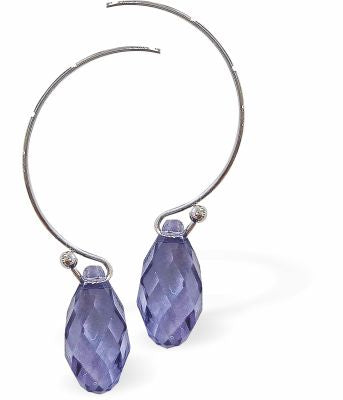 Sparkly Tanzanite Briolette Crystal Drops on Hoop Earrings Colour: Tanzanite Purple Rhodium Plated 36mm in size Hypoallergenic; Free from cadmium, lead and nickel 