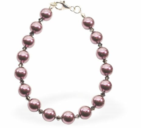 Austrian Crystal String of Pearls and Crystal Mix Bracelet Colour: Burgundy red and crystal mix Size: 42cm from clasp to clasp. See matching necklace (CP189) and drop earrings (CP191) 