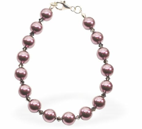 Austrian Crystal String of Pearls and Crystal Mix Bracelet Colour: Burgundy red and crystal mix Size: 42cm from clasp to clasp. See matching necklace (CP189) and drop earrings (CP191)