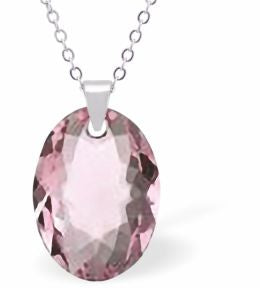 Austrian Crystal Multi Faceted Oval Elliptic Necklace Light Rose Pink in Colour 16mm in size Choice of 18" Stainless Steel or Sterling Silver Chain Hypo allergenic: Free from Lead, Nickel and Cadmium See matching earrings EL67