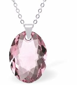 Austrian Crystal Multi Faceted Oval Elliptic Necklace Light Rose Pink in Colour 16mm in size Choice of 18" Stainless Steel or Sterling Silver Chain Hypo allergenic: Free from Lead, Nickel and Cadmium See matching earrings EL83