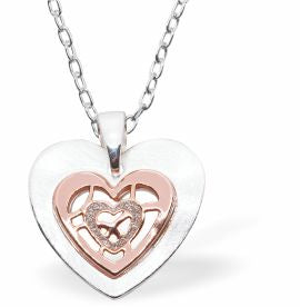 Heart in Heart Necklace Rose Gold and Silver Colour Rhodium Plated Hypoallergenic; Free from cadmium, lead and nickel 21mm in size with 18" Chain See matching drop earrings K615